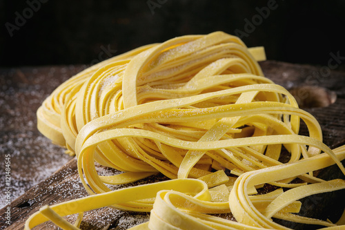 Raw homemade pasta tagliatelle photo