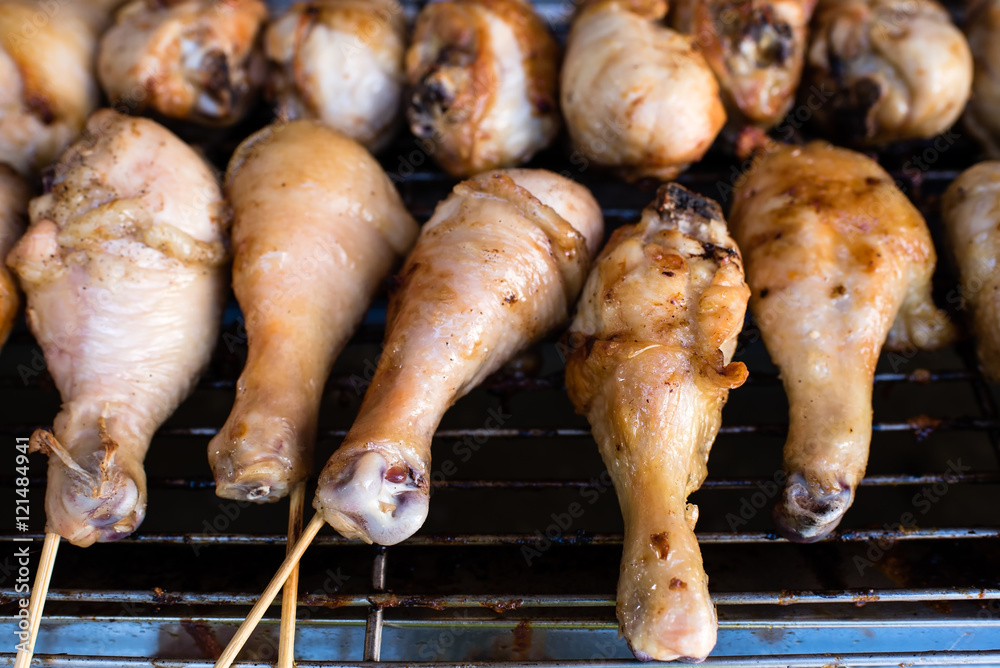 charcoal grilled chicken drumsticks Photos Adobe Stock