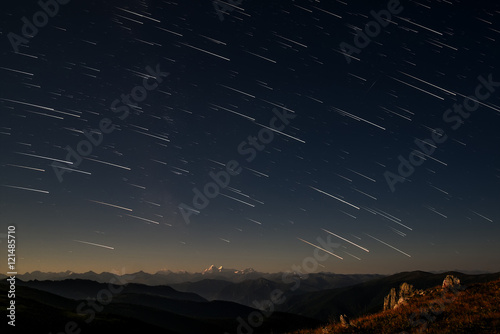 mountains star tracks sky