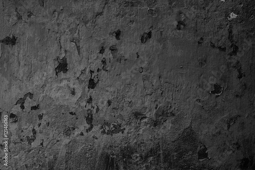Wall fragment with scratches and cracks