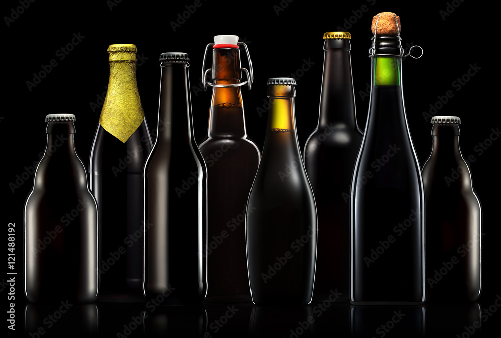 Set of beer bottles with clipping path isolated on black gradient background Set of beer bottles with clipping path isolated on black gradient background