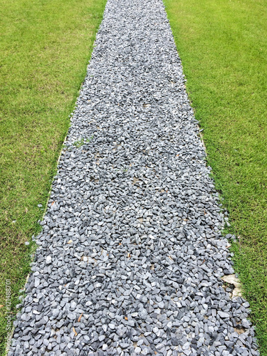 Wallpaper Mural Gray gravel walking path in a grass field/lawn of a garden Torontodigital.ca