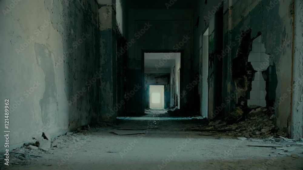 Tracking a long corridor/hallway of a big building destroyed by an earthquake and evacuated.Full motion control,tracking, pan, and tilt. Tracking a long corridor/hallway of a big building destroyed by an earthquake and evacuated.Full motion control,tracking, pan, and tilt.