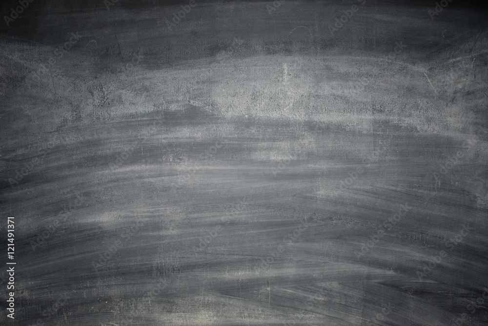 Chalk rubbed out on blackboard Chalk rubbed out on blackboard