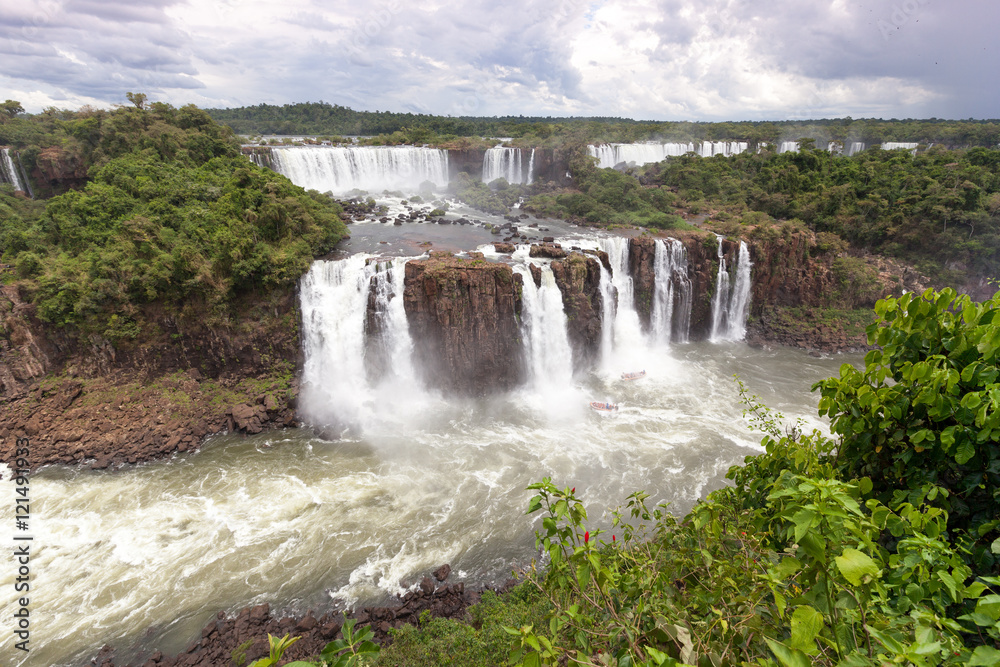 The cascade of falls in the jungle. Iguazu falls