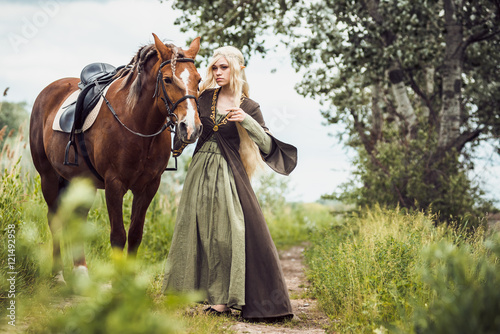 Elf woman in the forest with