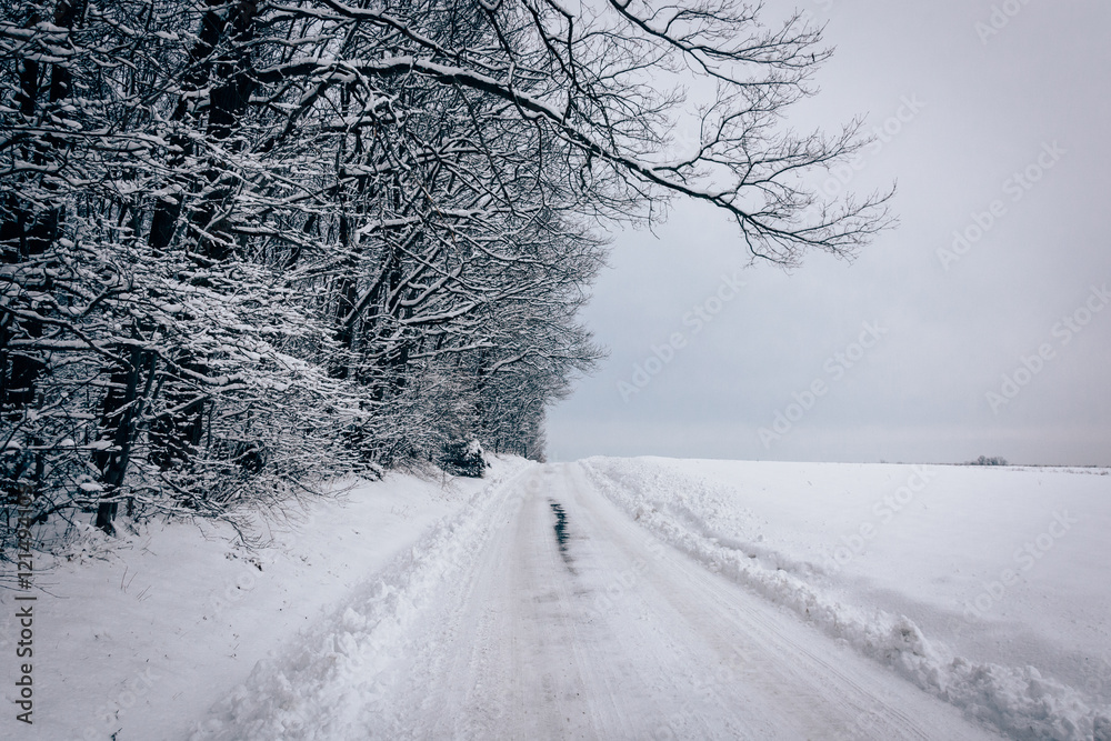 Snow covered road in rural Baltimore County, Maryland. Snow covered road in rural Baltimore County, Maryland.