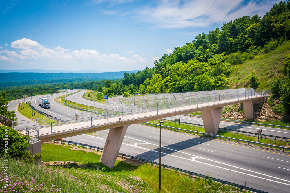 View of I-68 and a pedestrian bridge at Sideling Hill, Maryland.