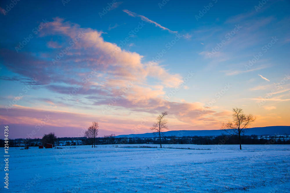 Winter sunset over a farm field in rural Frederick County, Maryl