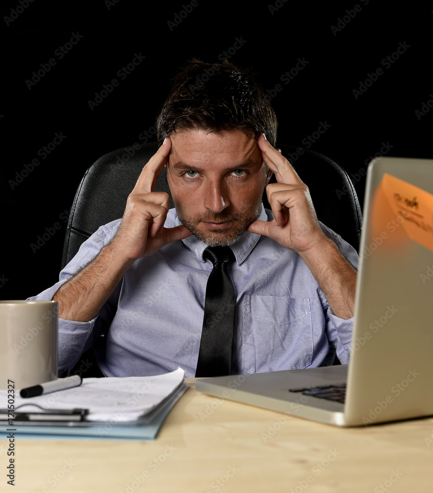 attractive tired businessman in shirt and tie tired overwhelmed heavy work load exhausted at office attractive tired businessman in shirt and tie tired overwhelmed heavy work load exhausted at office