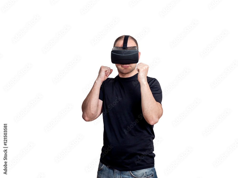 Man with virtual reality glasses fighting in a video game Man with virtual reality glasses fighting in a video game