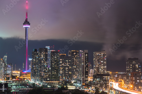 Photography Cloud's edge cuts through hot humid night time air in Toronto, Canada