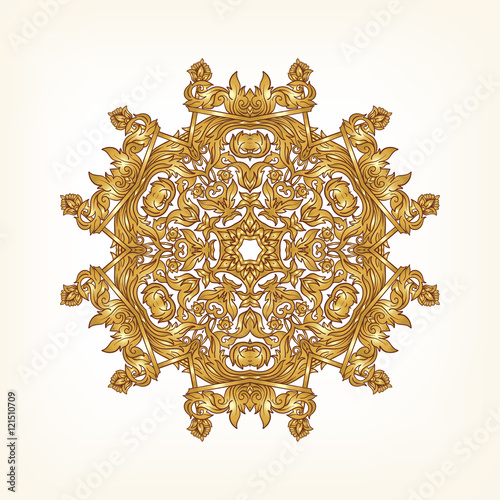 Vintage baroque mandala ornament in gold.