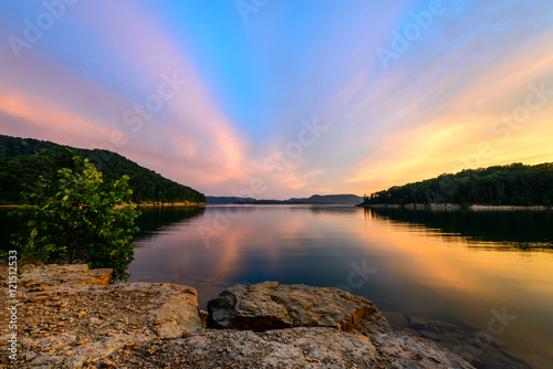 An amazingly colorful summer sky at Cave Run Lake in the Daniel Boone National Forest. Captured at Windy Bay Fishing Point. photo