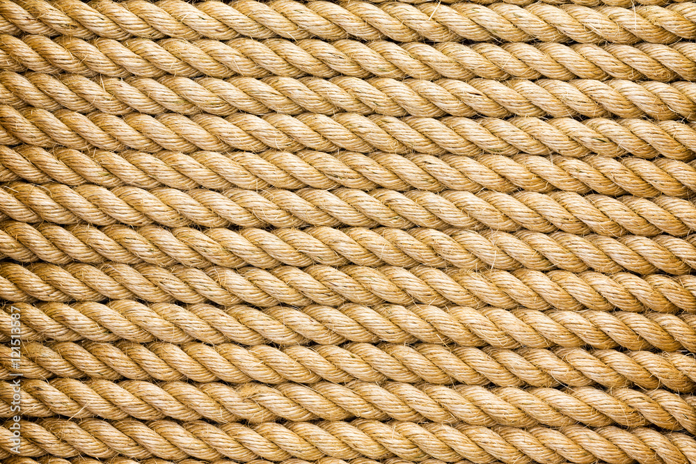 Neatly organised parallel strands of rope Neatly organised parallel strands of rope