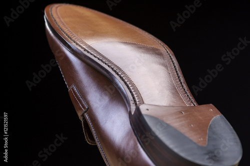 Downward Side of Penny Loafer Natural Leather Sole. Closeup Shot