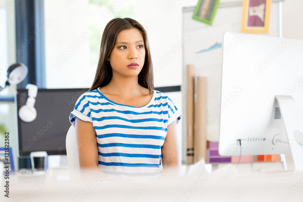 Young woman in office