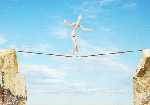 Bild auf Leinwand Ropewalker goes over the precipice
