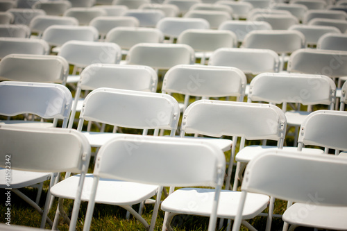 Rows of Empty White chairs