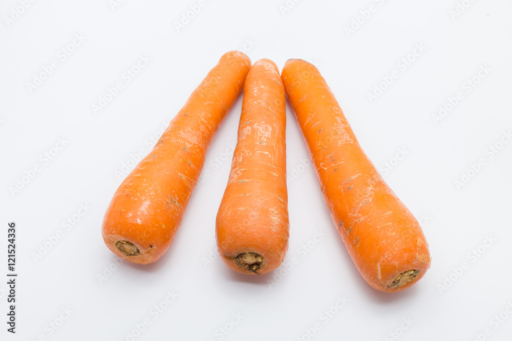 Fresh carrots isolated on white background