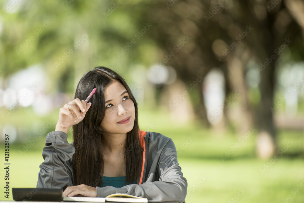 Asian woman college student on campus Asian woman college student on campus