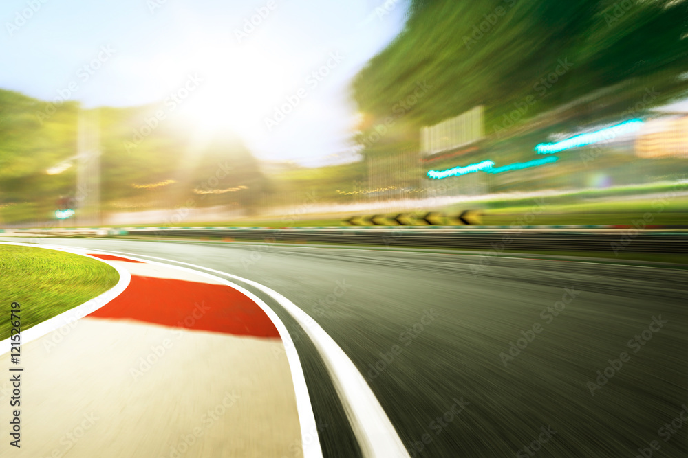 Motion blurred racetrack,sunset scene Motion blurred racetrack,sunset scene