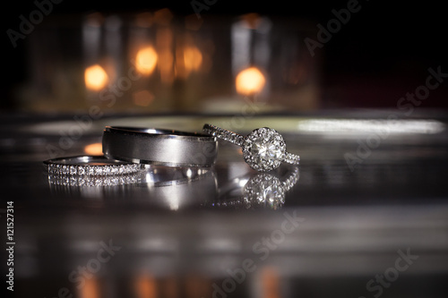Fotografie Wedding rings stacked on beautiful background 2.