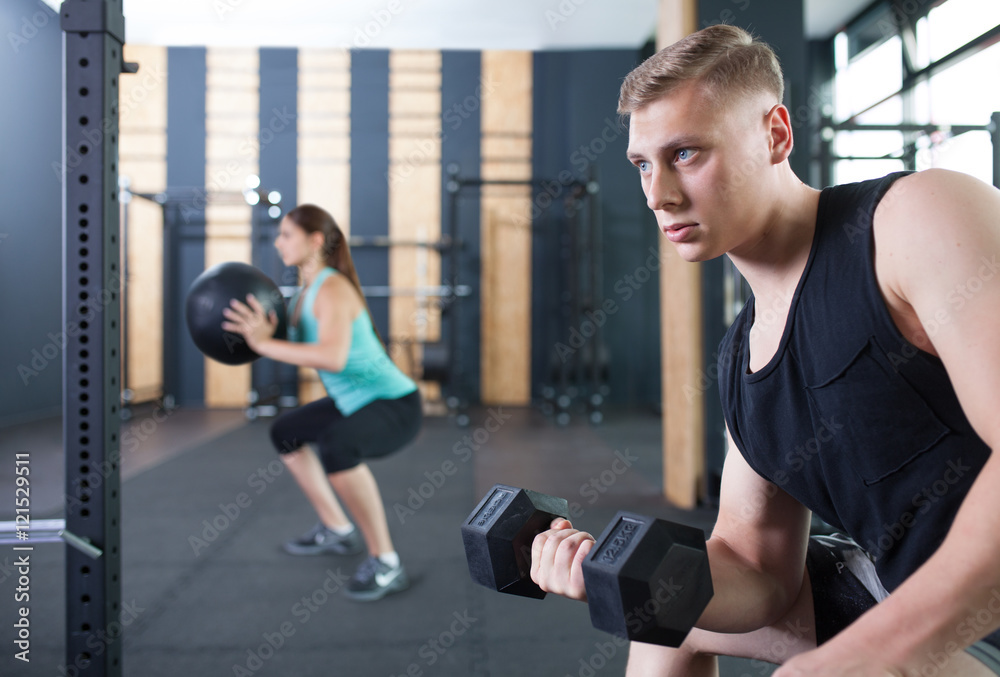 functional fitness workout with dumbbell at the gym functional fitness workout with dumbbell at the gym