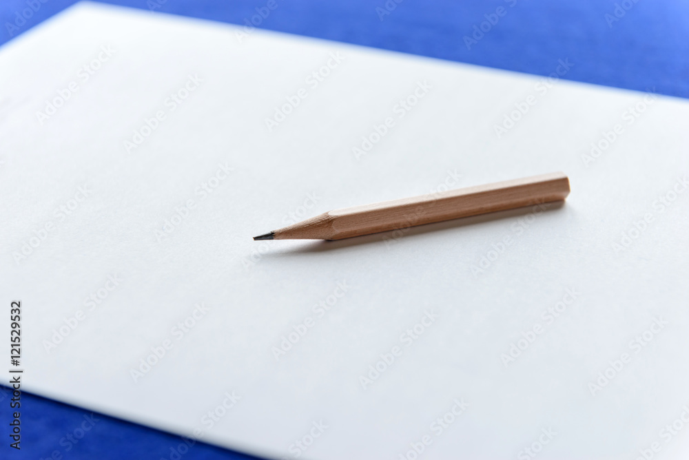 Wooden Pencils on white paper with copy space - Back to school Wooden Pencils on white paper with copy space - Back to school
