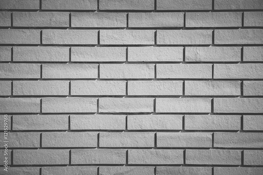 White brick tile wall seamless background and texture..