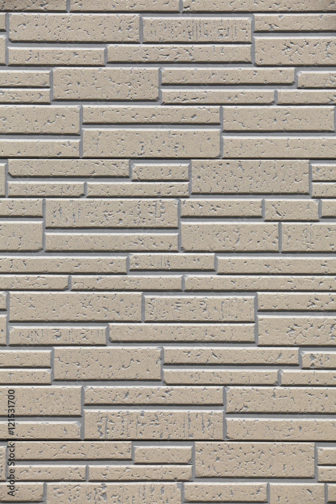 Fototapeta premium Brown modern wall tile background and texture