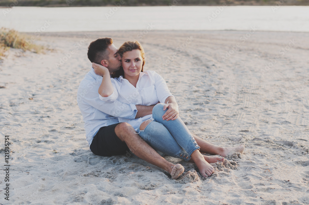 Young happy couple on the beach Young happy couple on the beach