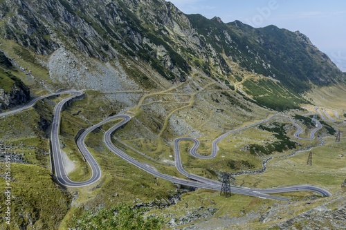 Transfagarasan - High altitude winding road in Carpathians mountains panorama. Aerial view.