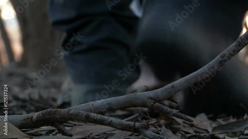 Crime. Frightened girl. Young woman crawls, runs away from the killer, murderer, a rapist. Bad man which it pursues and eventually kills. Dark forest at night.