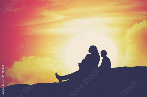silhouette mother and son with sunset background  vintage style