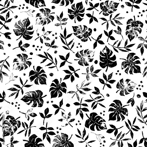 seamless graphical tropical foliage pattern with texture  modern grunge effect tropics nature leaves background allover print with dots