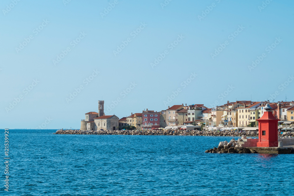 Coast of Piran with lighthouse in Slovenia