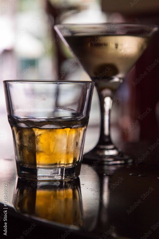 Glass of whiskey with ice Glass of whiskey with ice