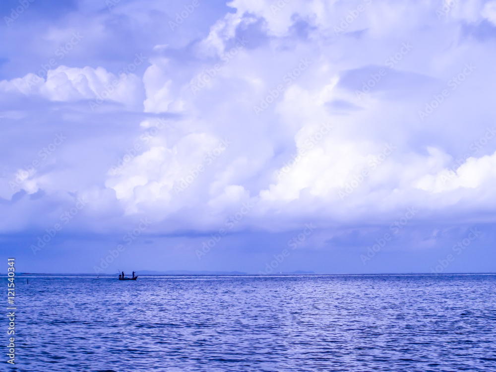Fishing boat and purple sea Fishing boat and purple sea