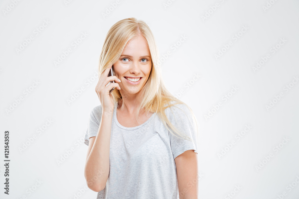 Cheerful casual woman talking on the phone Cheerful casual woman talking on the phone