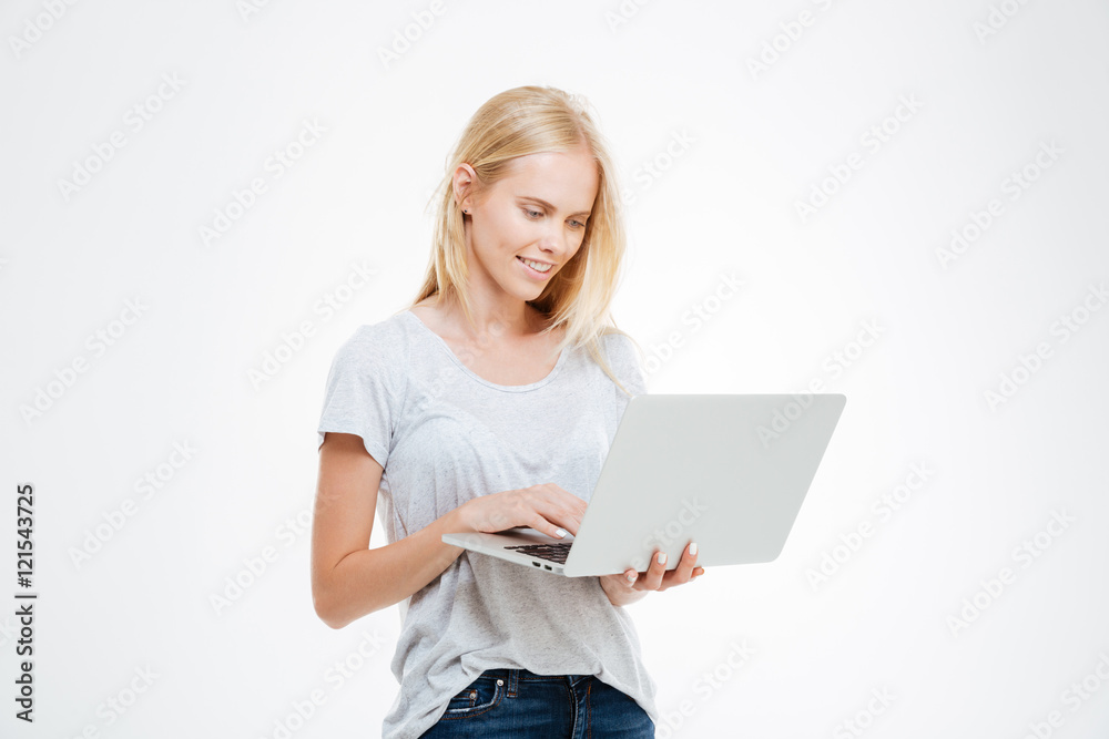 Portrait of a happy woman using laptop computer Portrait of a happy woman using laptop computer