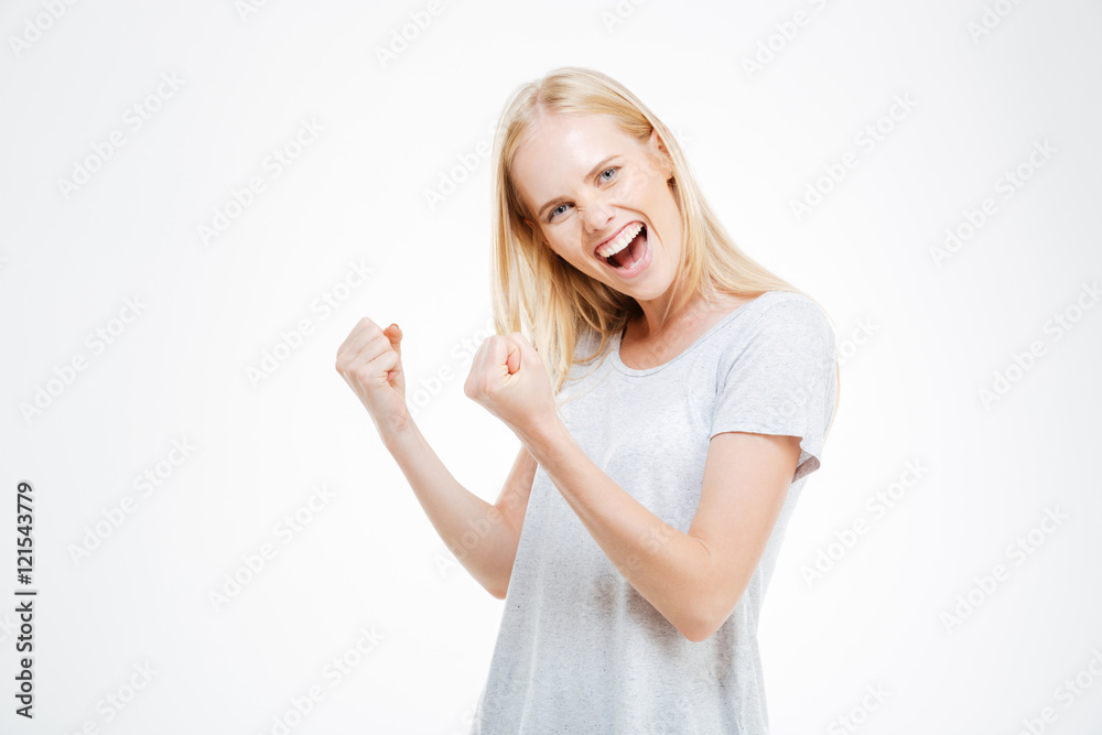 Portrait of a young woman celebrating her success Portrait of a young woman celebrating her success