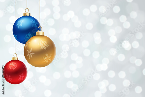 Multicolored Christmas Balls on Silver flare Background