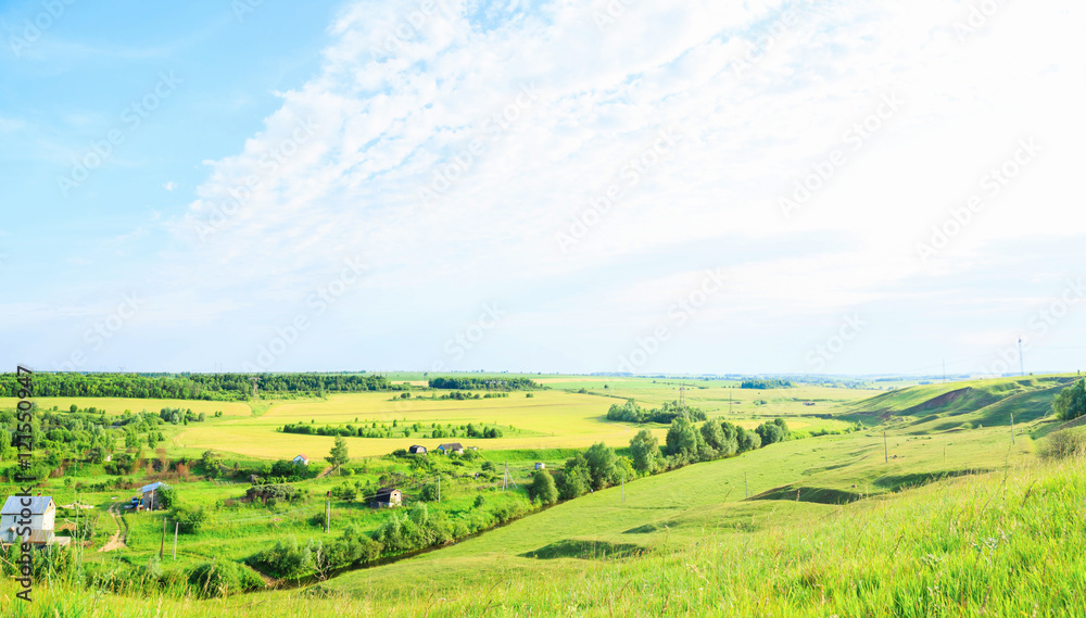 countryside in Russia, fields and cottage. Panorama.