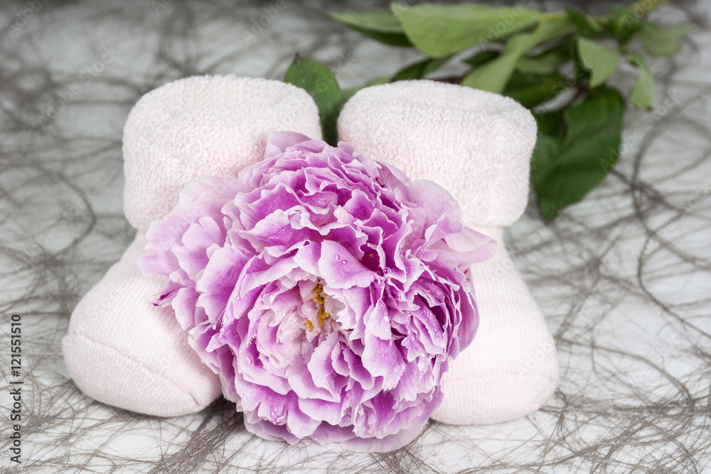 Pair of bootees for newborn girl with one peony with drops of water Pair of bootees for newborn girl with one peony with drops of water