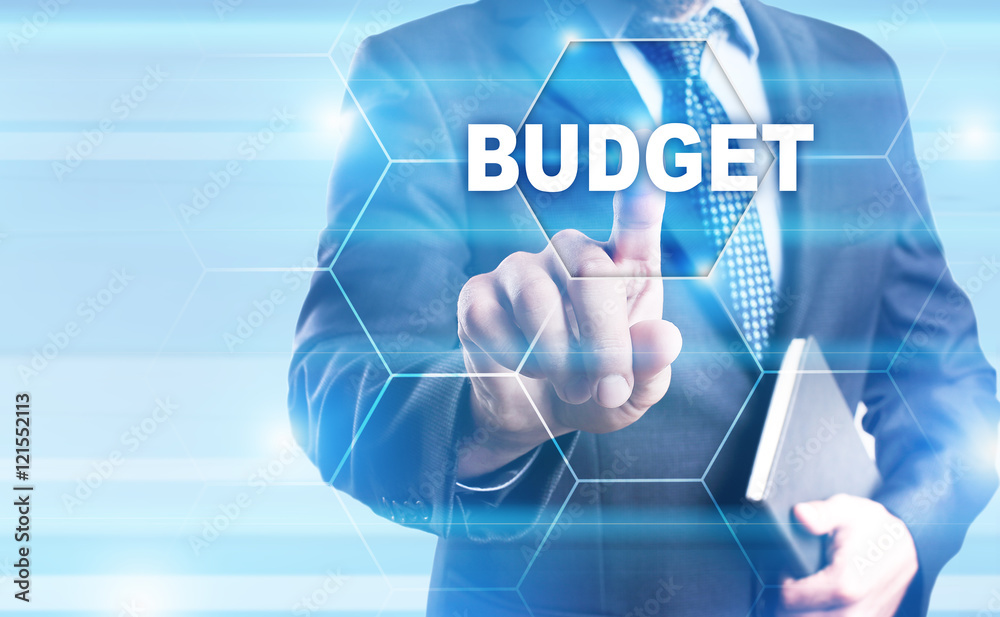 Businessman is pressing on the virtual screen and selecting 