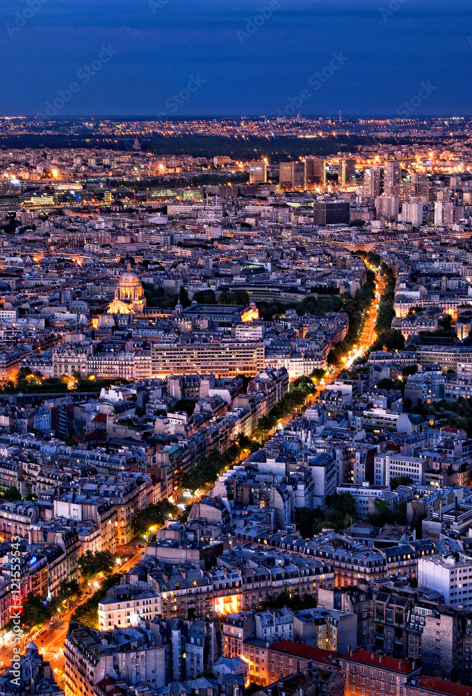 Illuminated street in Paris by night