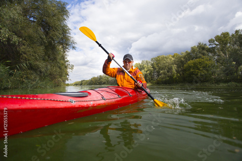 Kayaking on the river.