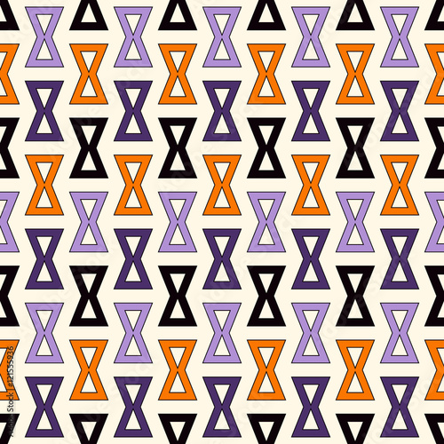 Seamless pattern in Halloween traditional colors. Bright ornamental abstract background.