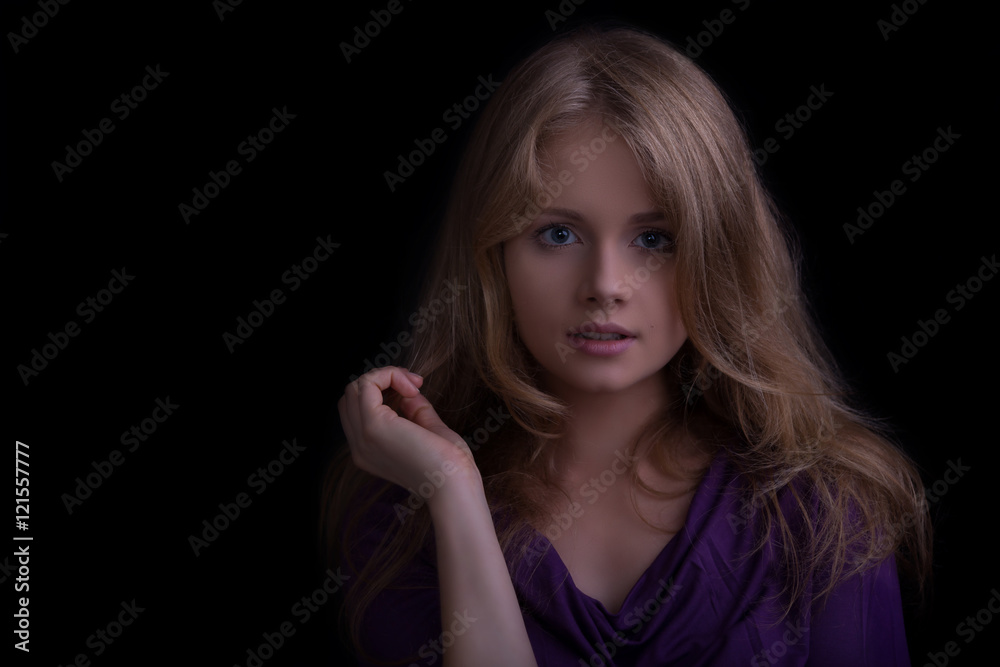 beautiful blond girl looking to the camera, dark tones beautiful blond girl looking to the camera, dark tones